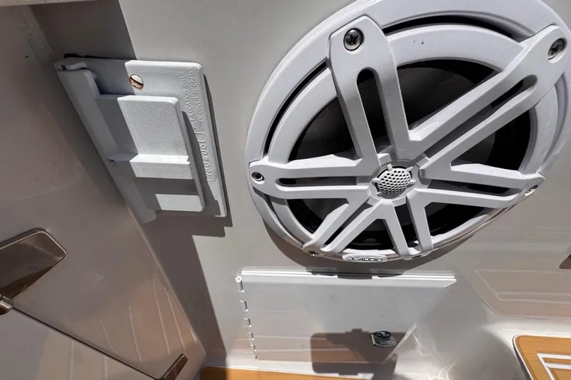 Slide: The Image of 2015 Four Winns H290 boat speaker and panel detail. - 51