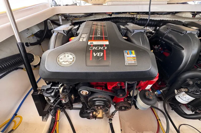 Slide: The Image of Engine of a 2015 Four Winns H290 boat, featuring a 300 V8 motor. - 80