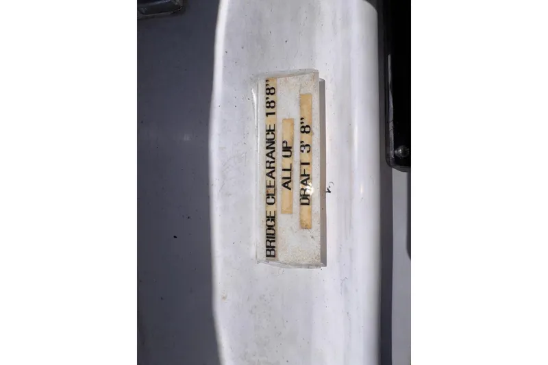 Slide: The Image of 1995 Island Gypsy Eurosedan 32 bridge clearance and draft specifications label. - 27