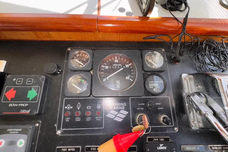 Slide: The Image of Control panel of a 1995 Island Gypsy Eurosedan 32 boat with gauges and switches. - 34