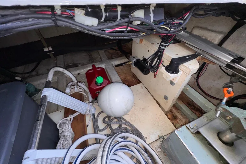 Slide: The Image of Interior view of 1995 Island Gypsy Eurosedan 32 boat showing wiring and equipment. - 48