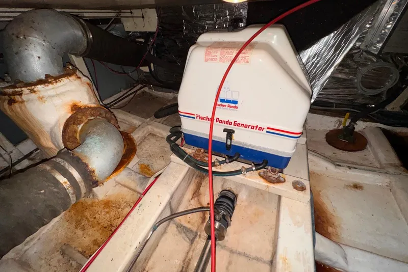 Slide: The Image of Engine room of 1995 Island Gypsy Eurosedan 32 with Fischer Panda generator. - 62