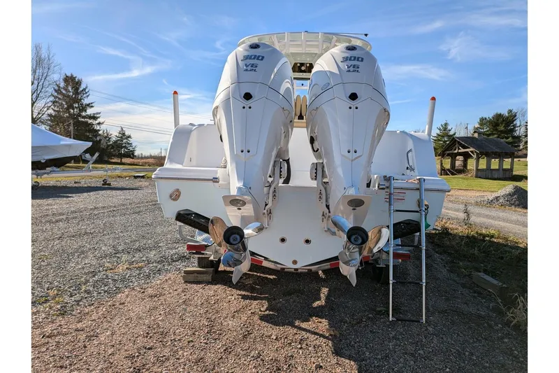 Slide: The Image of 2025 Sportsman Open 282 Center Console with twin 300 V6 engines, rear view. - 26