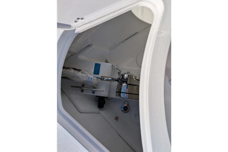 Slide: The Image of 2025 Sportsman Open 282 Center Console anchor compartment detail. - 6