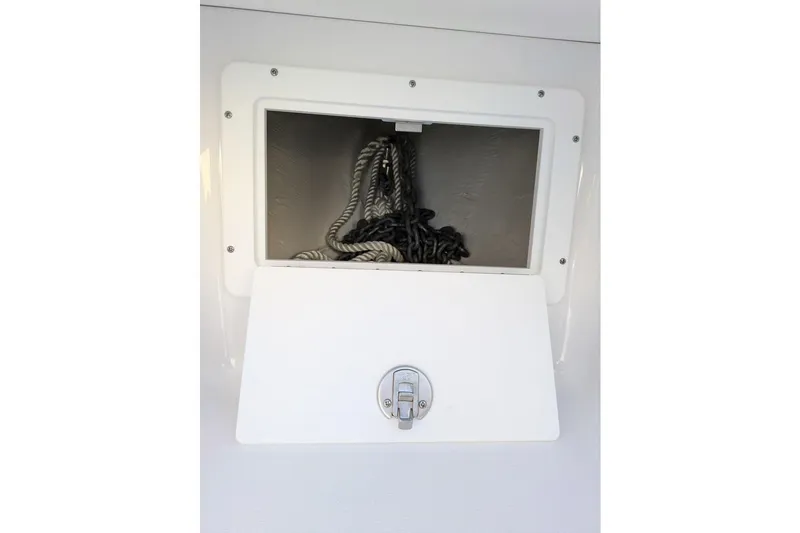 Slide: The Image of Anchor storage compartment on 2025 Sportsman Open 282 Center Console boat. - 8