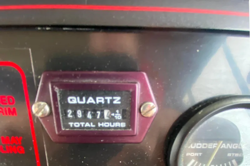 Slide: The Image of Instrument panel of 1989 Bayliner 3288 Motoryacht showing 2977.4 total hours. - 25