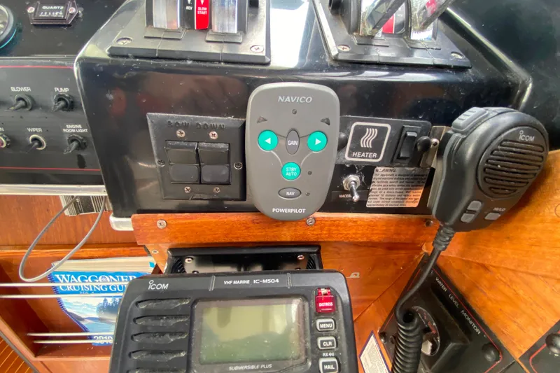 Slide: The Image of Control panel of a 1989 Bayliner 3288 Motoryacht with navigation and communication equipment. - 28
