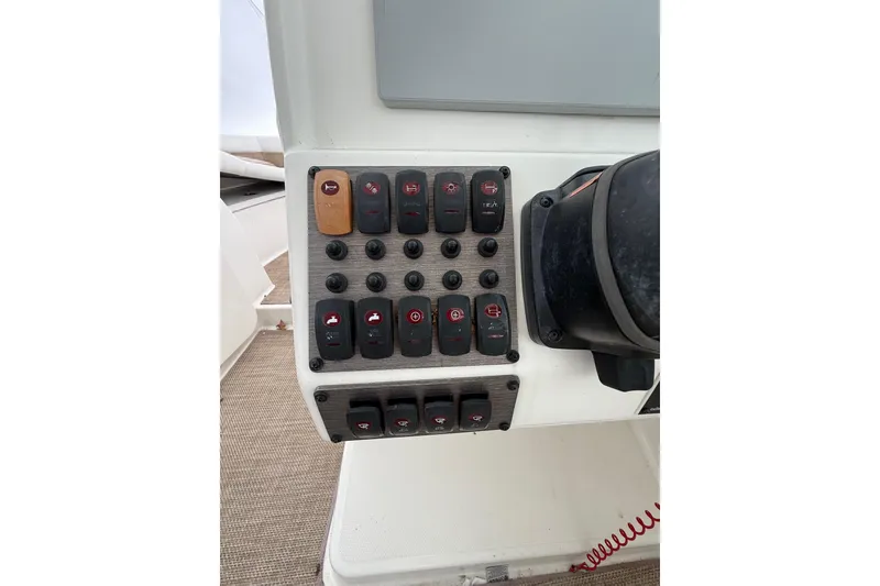 Slide: The Image of Control panel of 2019 World Cat Glacier Bay Edition 2740 Dual Console boat. - 10