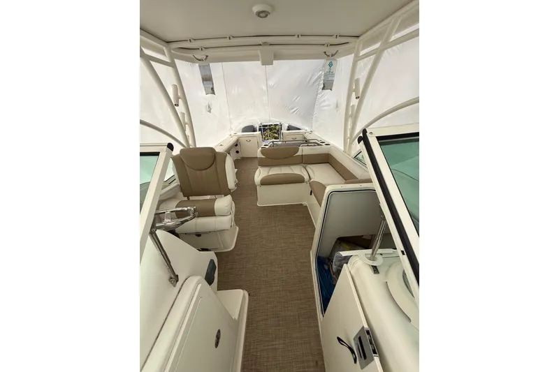 Slide: The Image of 2019 World Cat Glacier Bay Edition 2740 Dual Console interior with seating and helm. - 11