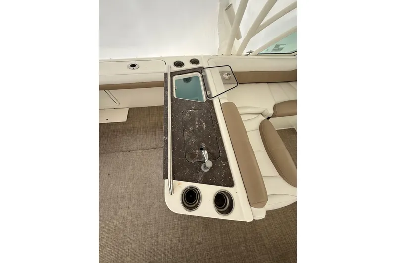 Slide: The Image of 2019 World Cat Glacier Bay Edition 2740 Dual Console interior with seating and console details. - 13