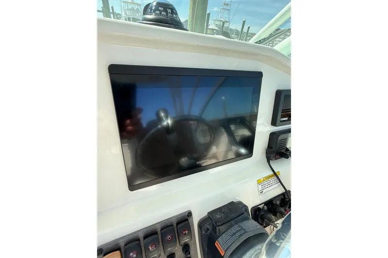 Slide: The Image of Control panel of 2019 World Cat Glacier Bay Edition 2740 Dual Console with Garmin display. - 38