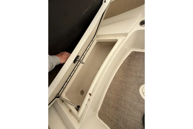 Slide: The Image of Storage compartment in 2019 World Cat Glacier Bay Edition 2740 Dual Console boat. - 4