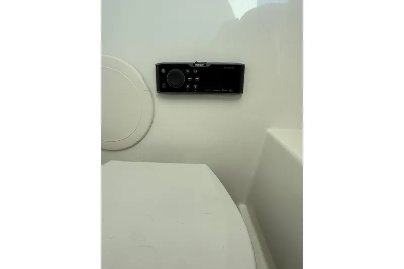 Slide: The Image of 2019 World Cat Glacier Bay Edition 2740 Dual Console interior with Fusion stereo system. - 48
