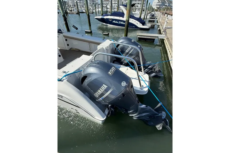 Slide: The Image of 2019 World Cat Glacier Bay Edition 2740 with dual Yamaha outboard engines docked at marina. - 60