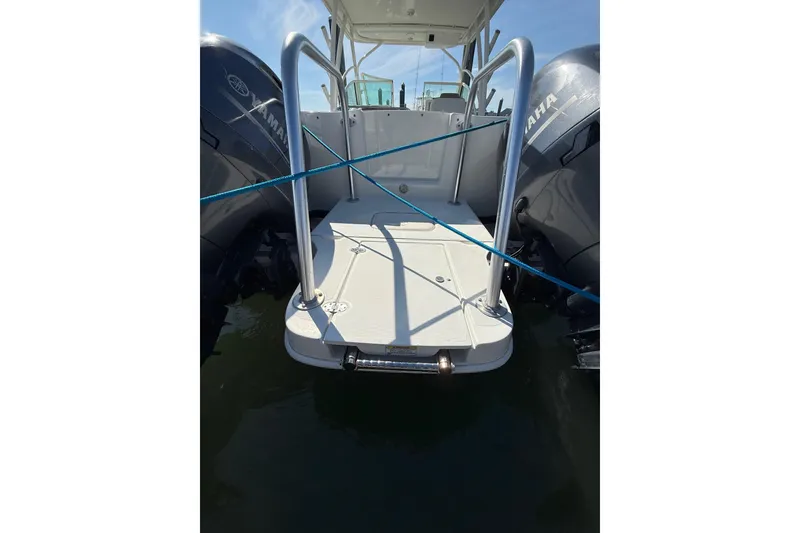 Slide: The Image of 2019 World Cat Glacier Bay Edition 2740 Dual Console boat with twin Yamaha engines. - 61
