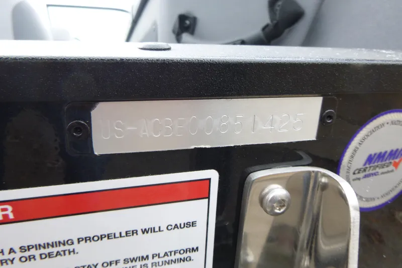 Slide: The Image of 2025 Alumacraft Trophy 185X Sport boat with visible hull identification number. - 16