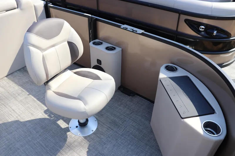 Slide: The Image of 2026 Bentley Pontoons Fish 220 4-Point interior with swivel chair and cup holders. - 2