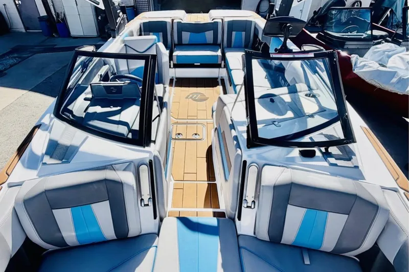 Slide: The Image of 2021 Malibu Wakesetter 23 MXZ boat interior with stylish seating and modern design. - 19