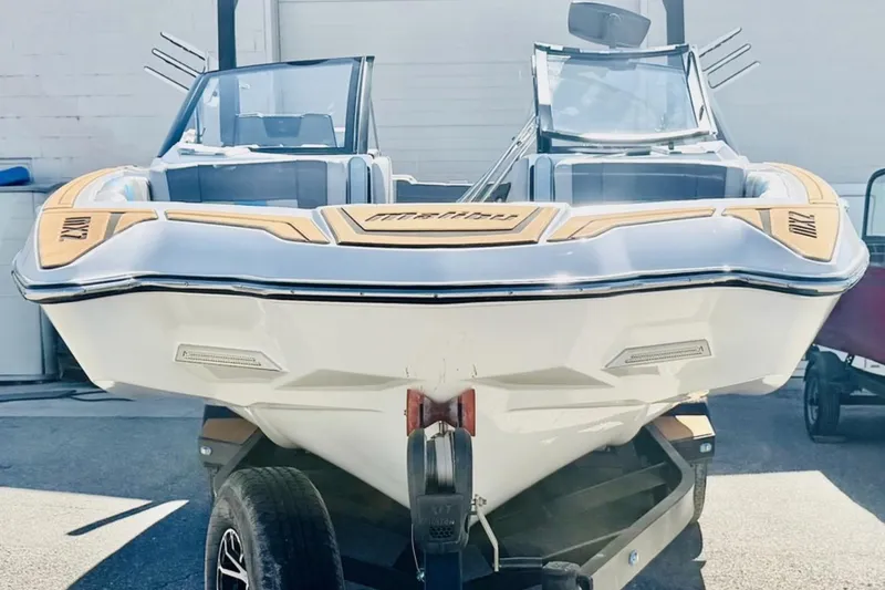 Slide: The Image of 2021 Malibu Wakesetter 23 MXZ boat on trailer, front view. - 8