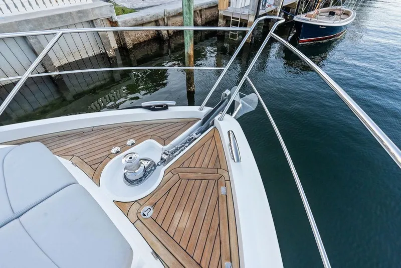 Slide: The Image of Bow of 2021 Sunseeker Manhattan 68 yacht with teak decking and anchor system. - 17