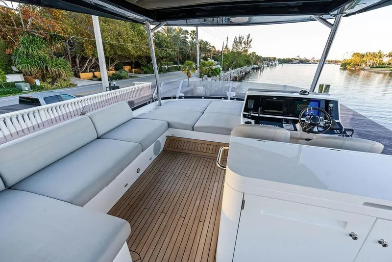 Slide: The Image of Luxurious 2021 Sunseeker Manhattan 68 yacht with spacious deck and modern helm. - 31