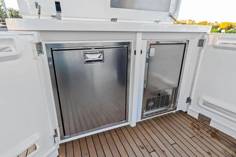 Slide: The Image of Stainless steel appliances on Sunseeker Manhattan 68 yacht, 2021 model, with teak flooring. - 34