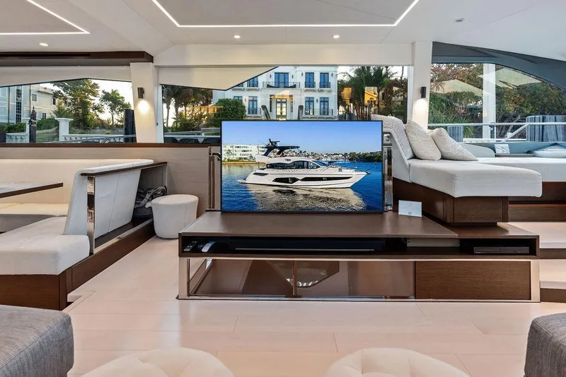 Slide: The Image of Luxurious interior of 2021 Sunseeker Manhattan 68 yacht with modern seating and large windows. - 39