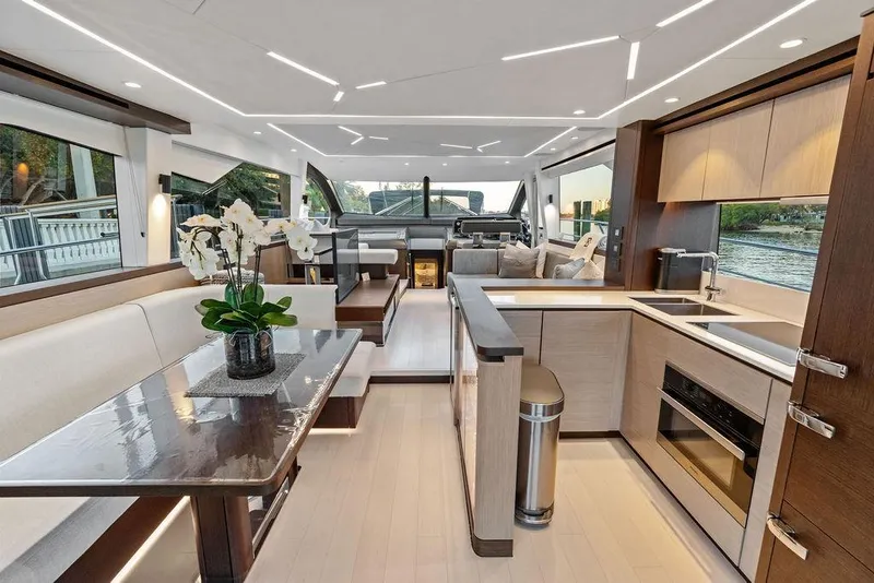 Slide: The Image of Luxurious interior of 2021 Sunseeker Manhattan 68 yacht with modern kitchen and dining area. - 41