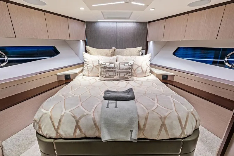 Slide: The Image of Luxurious bedroom interior of 2021 Sunseeker Manhattan 68 yacht with elegant bedding. - 50