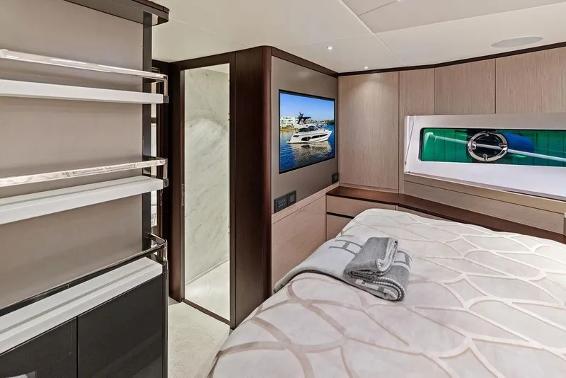 Slide: The Image of Luxurious interior of 2021 Sunseeker Manhattan 68 yacht bedroom with modern decor. - 51