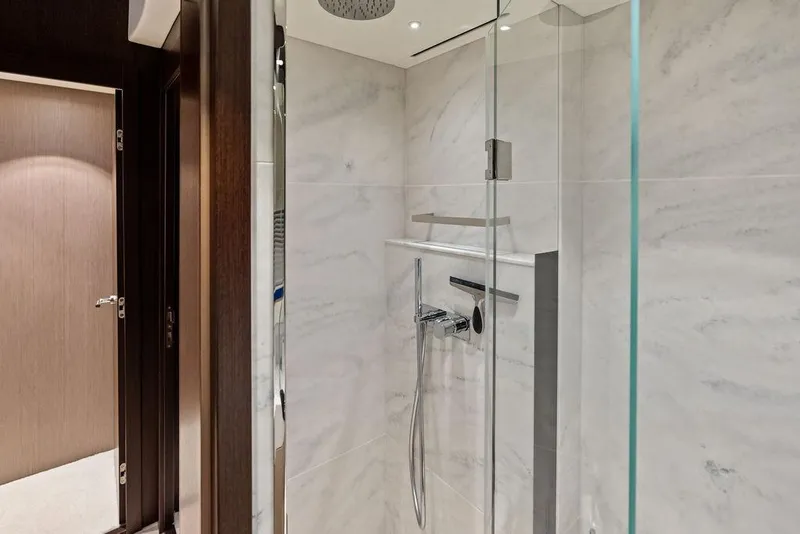 Slide: The Image of Luxurious shower area in 2021 Sunseeker Manhattan 68 yacht with modern fixtures. - 59