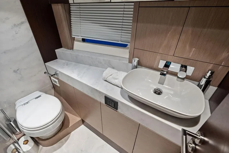 Slide: The Image of Luxurious bathroom in 2021 Sunseeker Manhattan 68 yacht with modern fixtures and elegant design. - 60