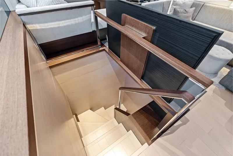 Slide: The Image of Staircase on Sunseeker Manhattan 68 yacht, 2021 model, featuring modern interior design. - 61