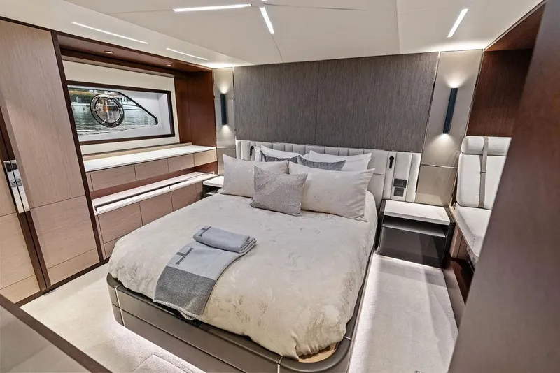 Slide: The Image of Luxurious bedroom interior of 2021 Sunseeker Manhattan 68 yacht, featuring elegant design and modern amenities. - 62