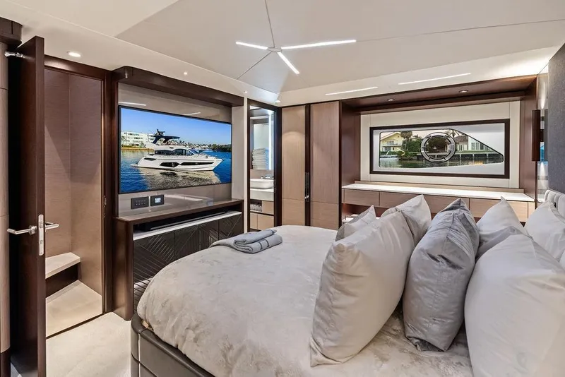 Slide: The Image of Luxurious interior of 2021 Sunseeker Manhattan 68 yacht bedroom with modern amenities. - 66