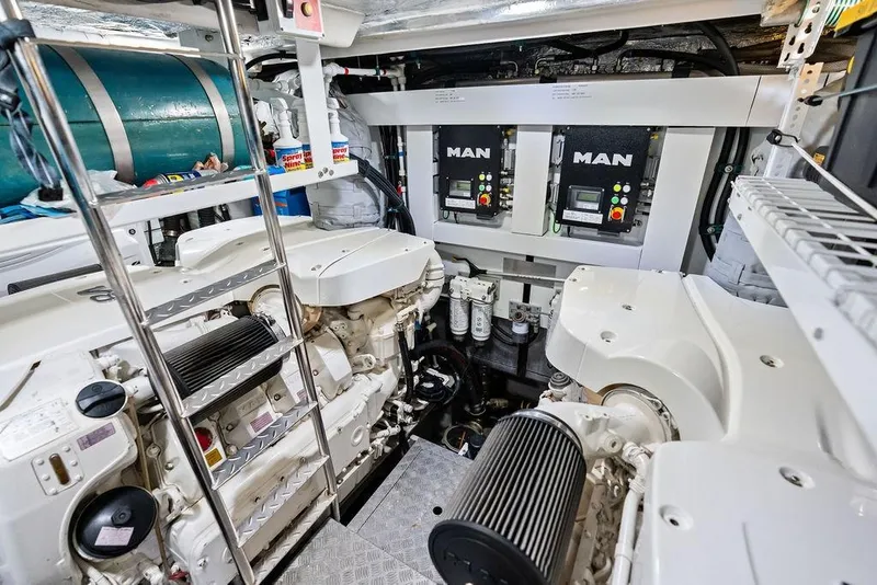 Slide: The Image of Engine room of 2021 Sunseeker Manhattan 68 yacht, featuring MAN engines and equipment. - 72