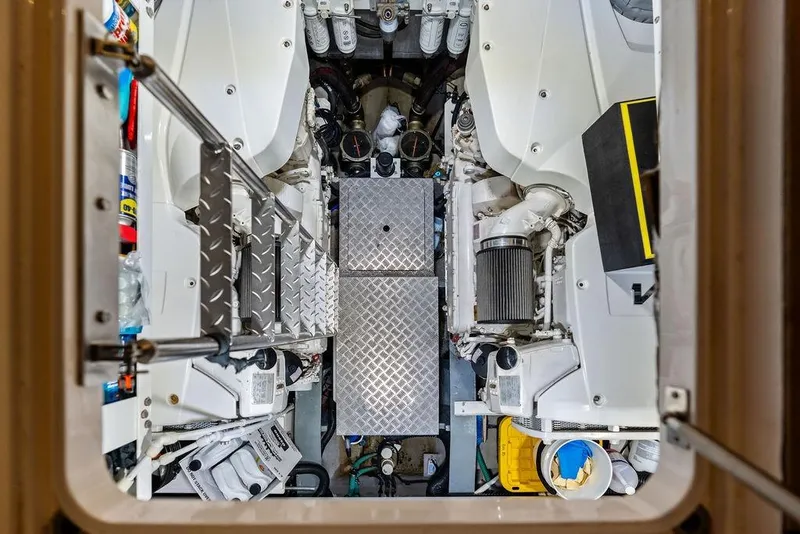 Slide: The Image of Engine room of 2021 Sunseeker Manhattan 68 yacht, featuring machinery and equipment. - 74
