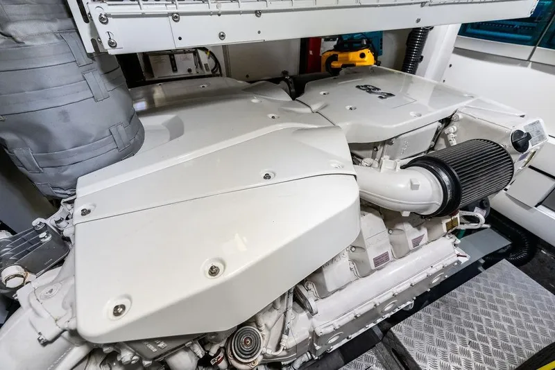 Slide: The Image of Engine room of 2021 Sunseeker Manhattan 68 yacht, showcasing powerful machinery. - 78