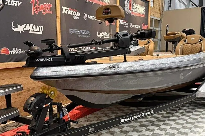 Slide: The Image of 2026 Ranger Z520R Ultra boat on display with Lowrance equipment and Ranger Trail trailer. - 14
