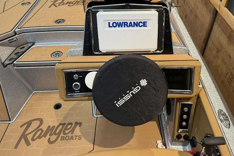 Slide: The Image of 2026 Ranger Z520R Ultra boat dashboard with Lowrance electronics and custom steering wheel cover. - 4