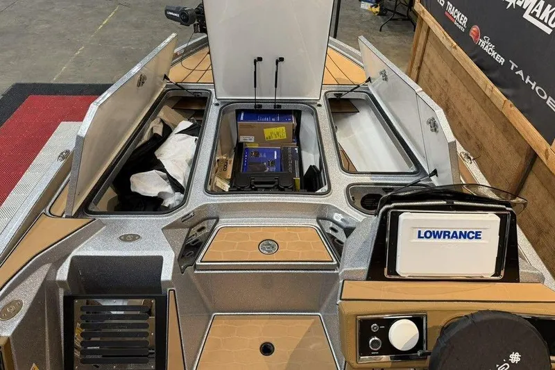 Slide: The Image of 2026 Ranger Z520R Ultra boat deck with storage compartments and Lowrance electronics. - 5