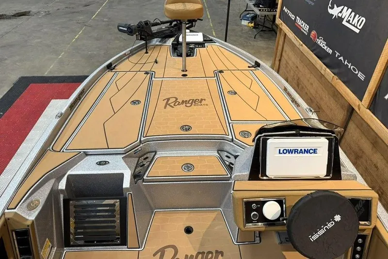 Slide: The Image of 2026 Ranger Z520R Ultra boat deck with Lowrance electronics and stylish design. - 6