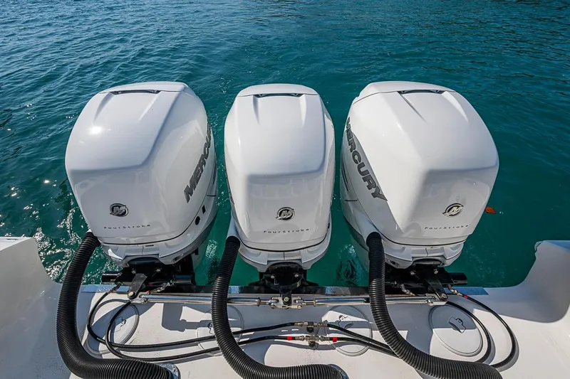 Slide: The Image of Triple Mercury outboard engines on a 2020 Fountain 38 Center Console boat. - 10