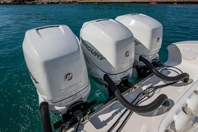 Slide: The Image of Triple Mercury outboard engines on a 2020 Fountain 38 Center Console boat. - 9
