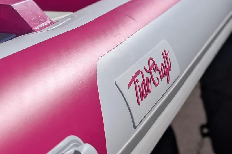 Slide: The Image of 2026 Tide Craft Custom Pink & White Catalina 13 boat, featuring sleek design and vibrant colors. - 6