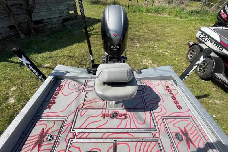 Slide: The Image of 2020 Xpress X21 Pro boat with Yamaha 175 engine, featuring custom deck design. - 7