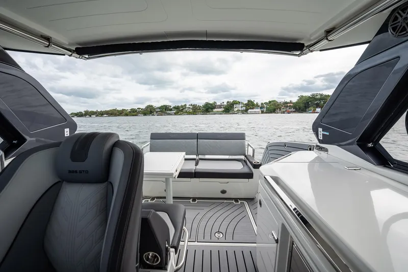 Slide: The Image of 2023 Galeon 325 GTO yacht interior with seating and water view. - 17