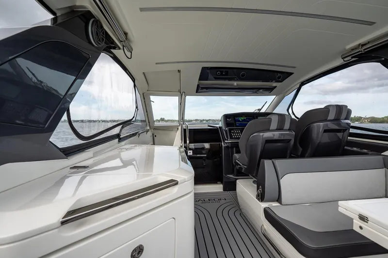 Slide: The Image of Interior of 2023 Galeon 325 GTO yacht, featuring modern seating and sleek design. - 18