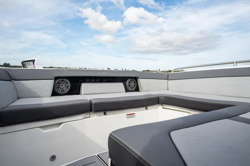 Slide: The Image of 2023 Galeon 325 GTO boat interior with sleek seating and modern design. - 24