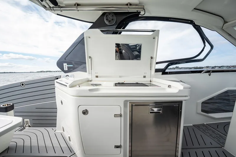 Slide: The Image of Outdoor kitchen on 2023 Galeon 325 GTO yacht with grill and storage. - 26